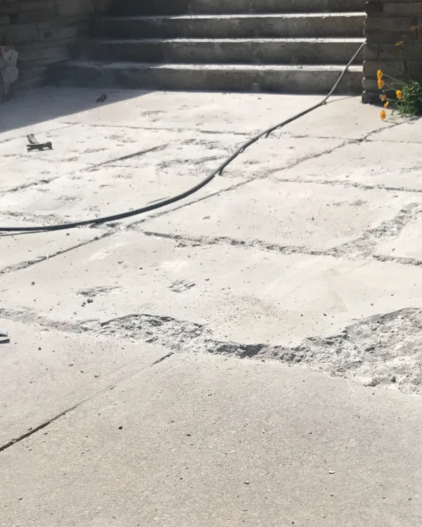 Crumbling church entrance steps in Oakville before repair
