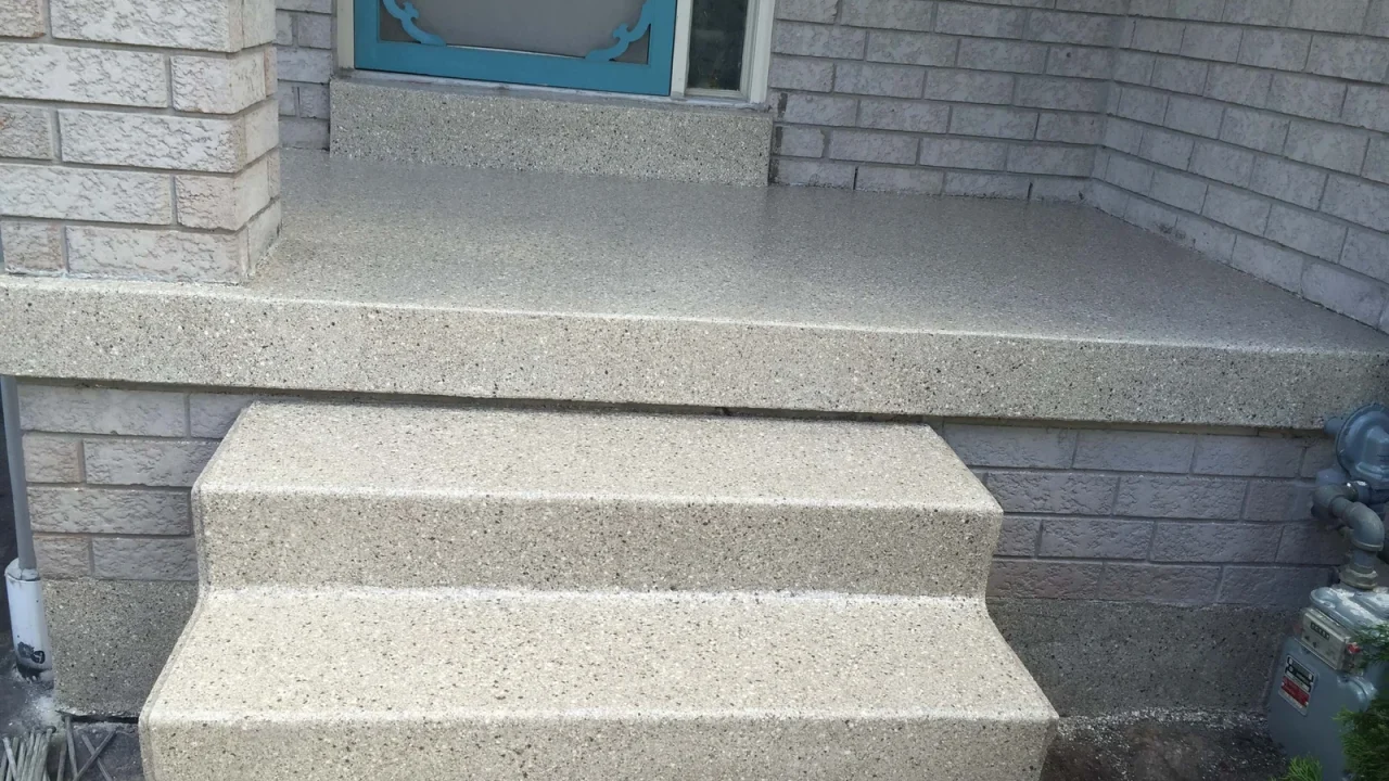 Front porch resurfaced with a broadcast-flake finish