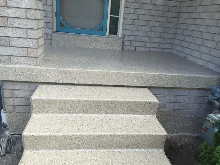 Front porch resurfaced with a broadcast-flake finish